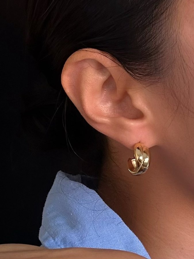 Chunky hoops i stål med 18K guld med tvinnad design