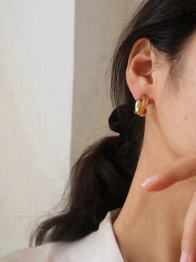 Chunky hoops i stål med 18K guld med tvinnad design