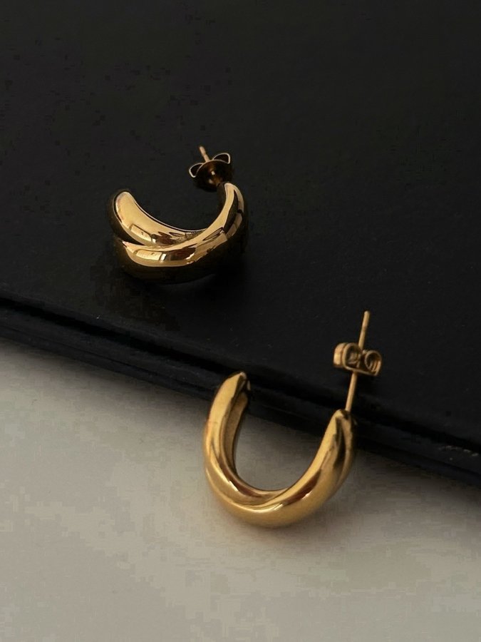 Chunky hoops i stål med 18K guld med tvinnad design