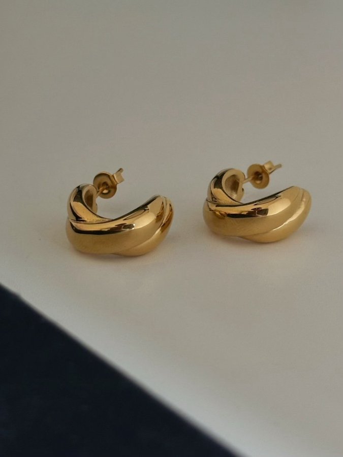 Chunky hoops i stål med 18K guld med tvinnad design