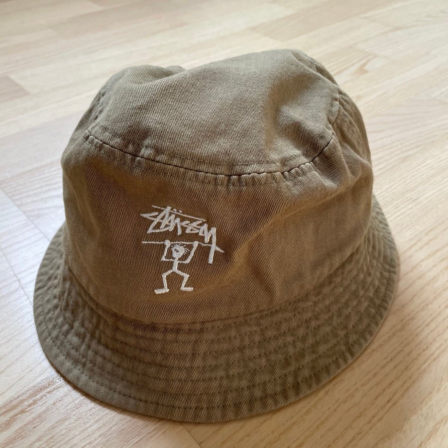 Stussy ”Warrior Man” Bucket Hat, M/L (One size)