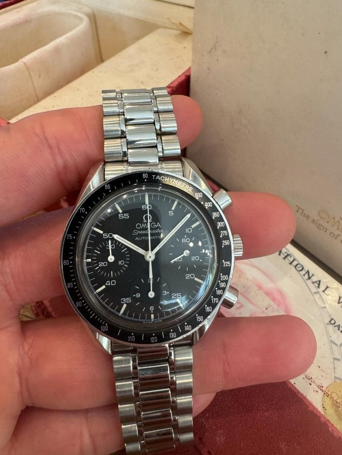 Omega Speedmaster Reduced med box  papper