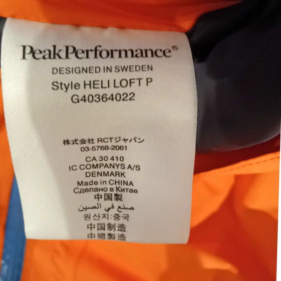 Peak Performance orange skidbyxor, storlek M