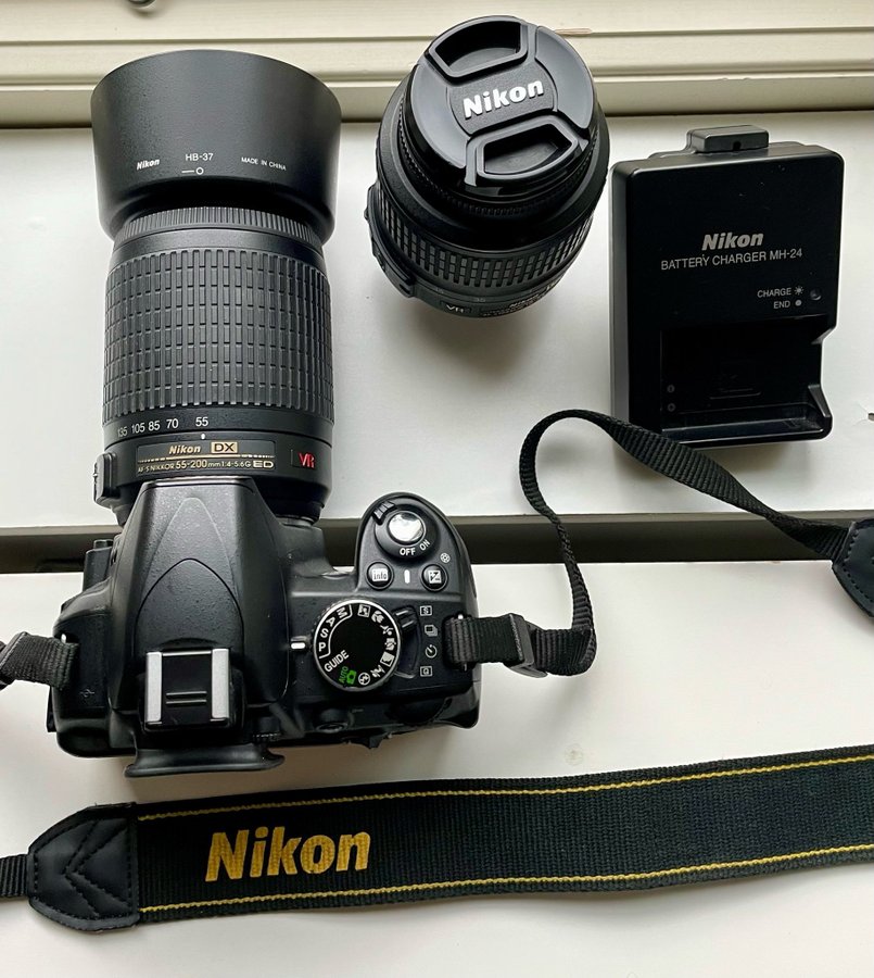 Nikon D3100 with lenses 18-55mm and 55-200mm