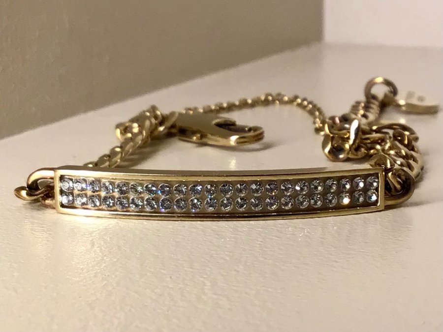 Dyrberg  Kern, guld tonat armband i rostfritt stål och Swarovski kristall!