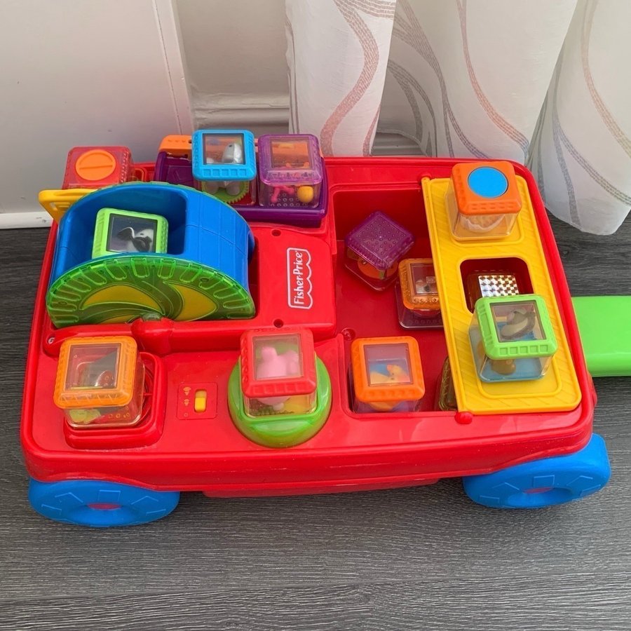 Fisher-Price vagn aktivitetsvagn MKT FINT SKICKretro klossar musik ljus dragvagn