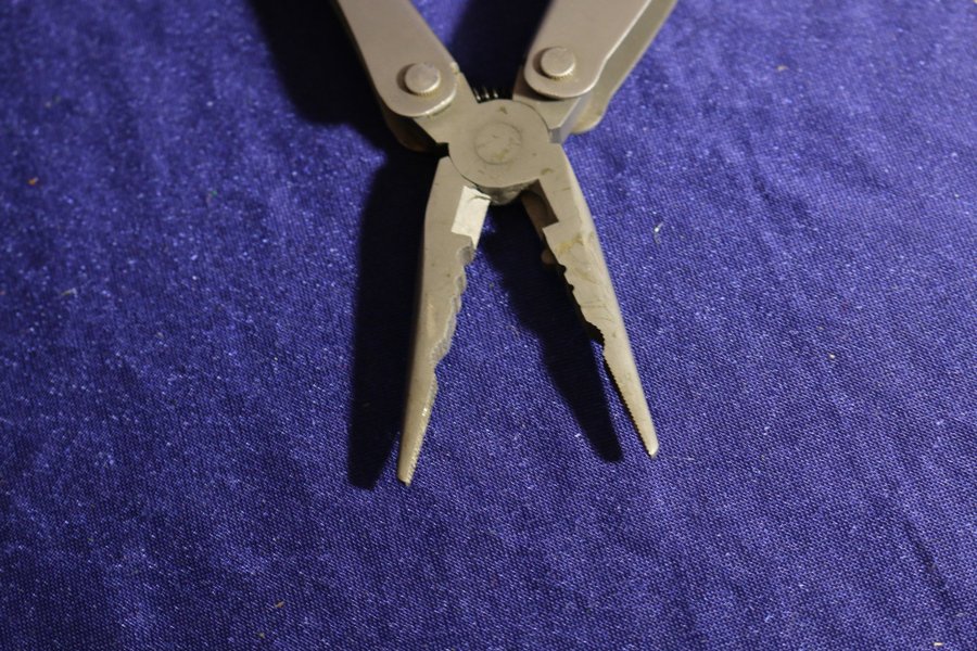 Multitool multiverktyg med läderfodral