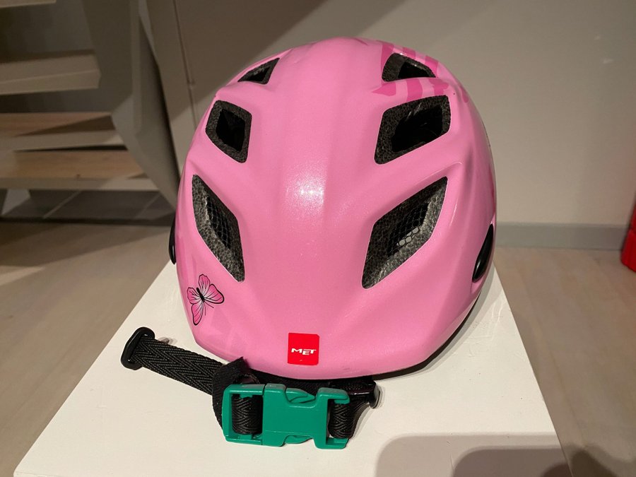 Barncykelhjälm MET rosa med fjärilar