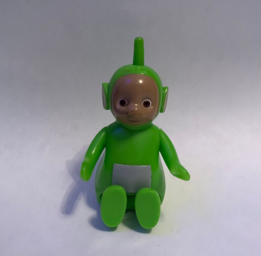 Teletubbies Dipsy Grön figur rörliga armar, kan sitta och stå