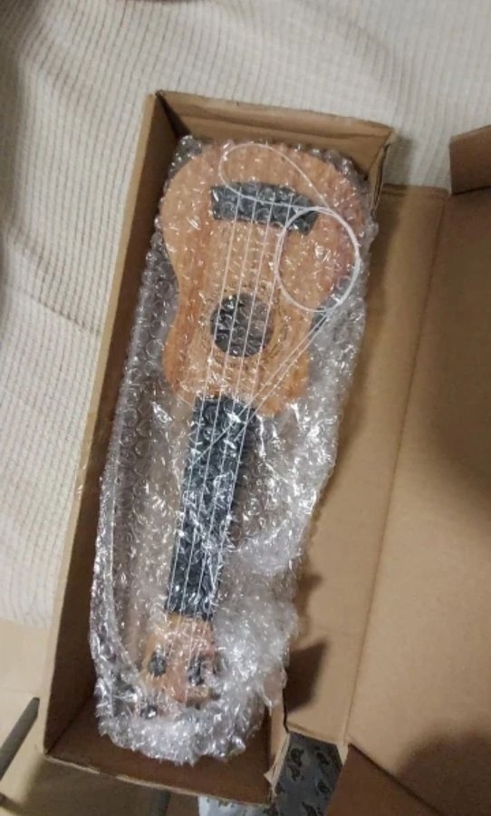 Helt ny Liten guitar Ukulele för barn - lära sig spela musik instrument