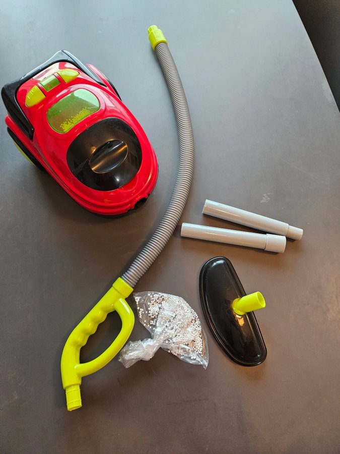 Toy Vacuum cleaner / hoover with sound and light - röd dammsugare