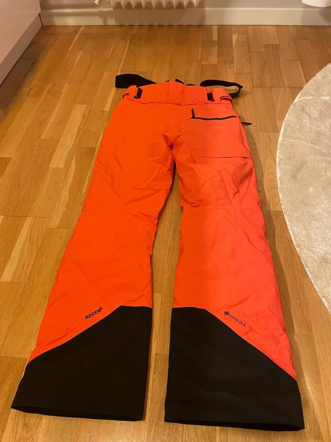 Peak Performance orange skidbyxor, storlek XS