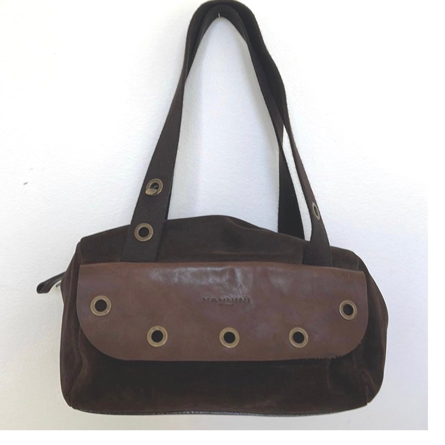 Nannini shoulder bag in suede and leather with metal rings