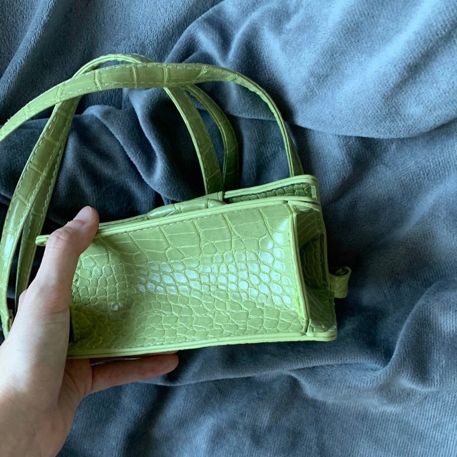 Sweet tiny green bag