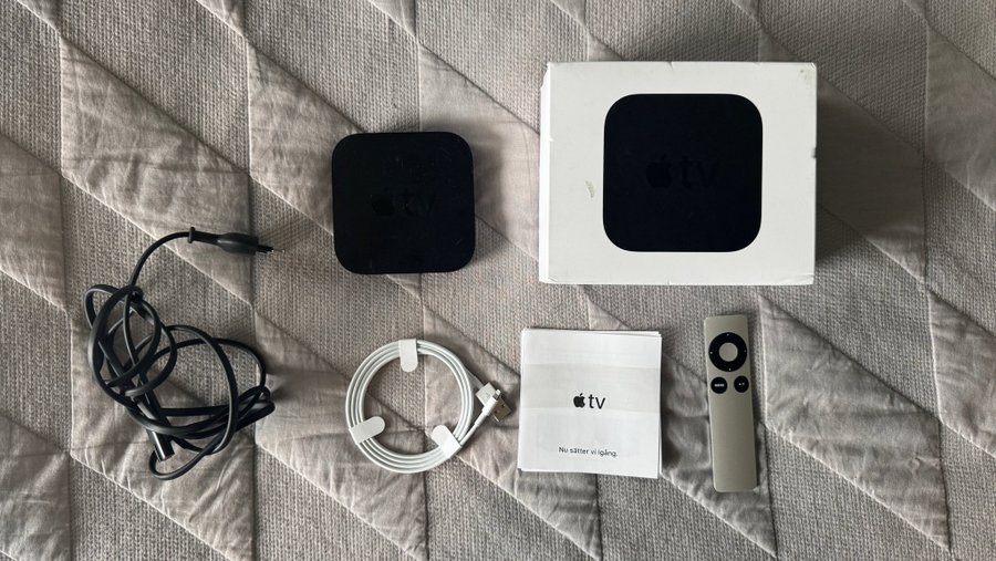 Apple TV 3rd Generation plus remote, power cable, lightening cable and box