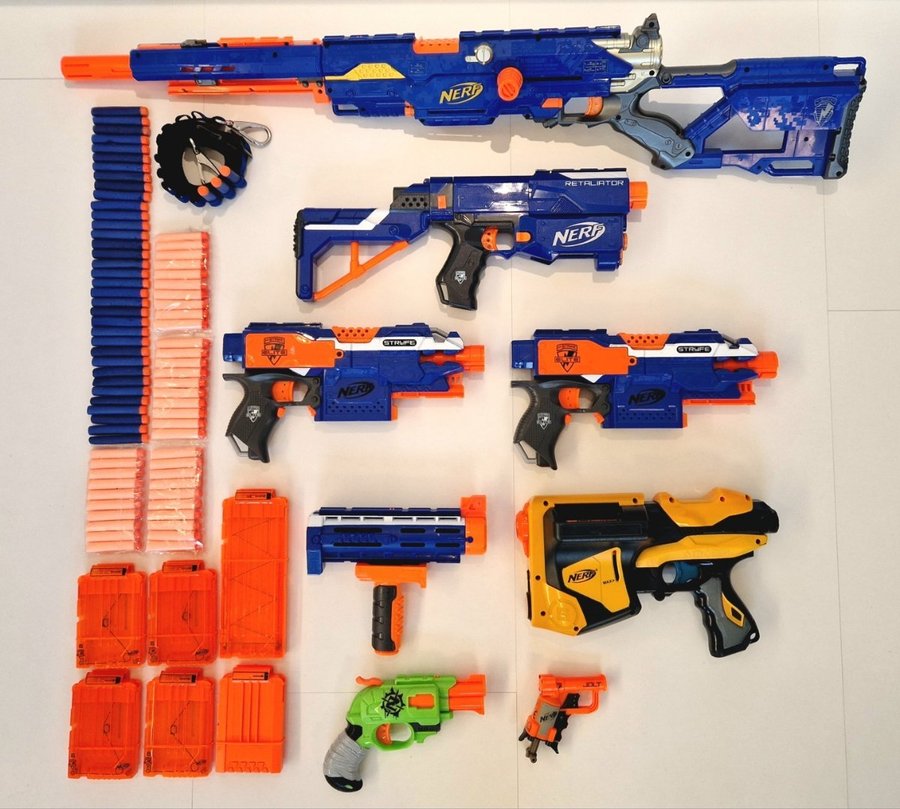 Nerf-paket med 7 vapen, 80 pilar, bälte och tillbehör