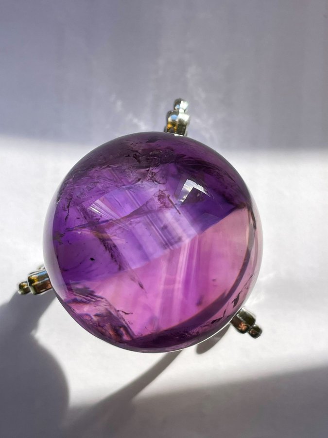 Ametrine och amethyst sphere with Trapiche zones