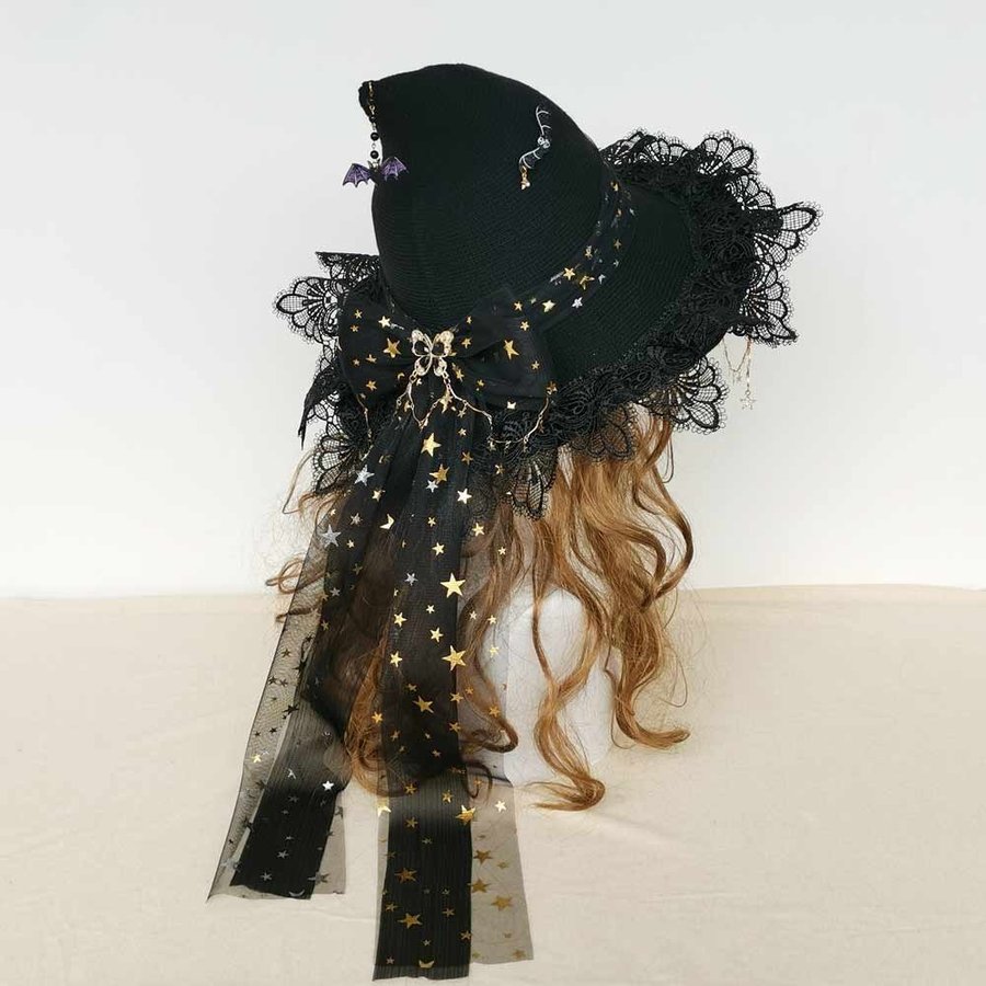 Handmade black wool blend witch hat with bow. Crochet Halloween wizard hat