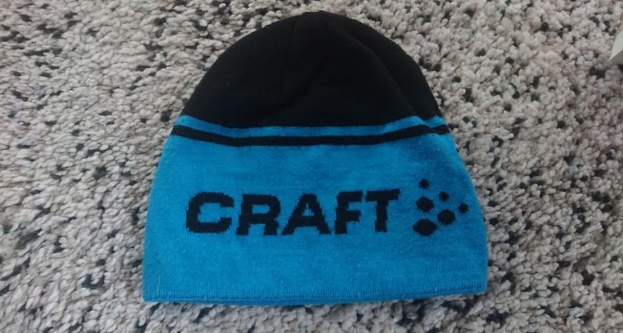 Craft blå och svart mössa, storlek L/XL