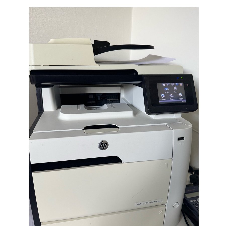 Hp laserjet 300 color.