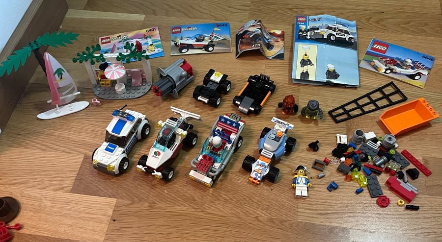 Lego paket med bilar figurer tillbehör från bla 6401 6648 8657 7236 6646