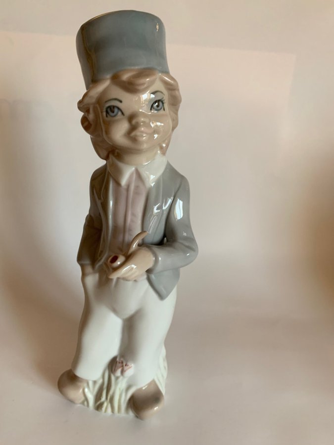 Casades porcelain figurine, young man with a hat  a pipe, 24 cm