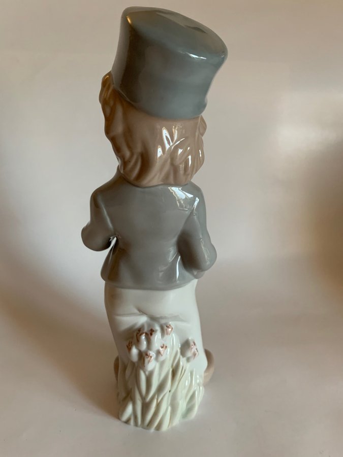 Casades porcelain figurine, young man with a hat  a pipe, 24 cm