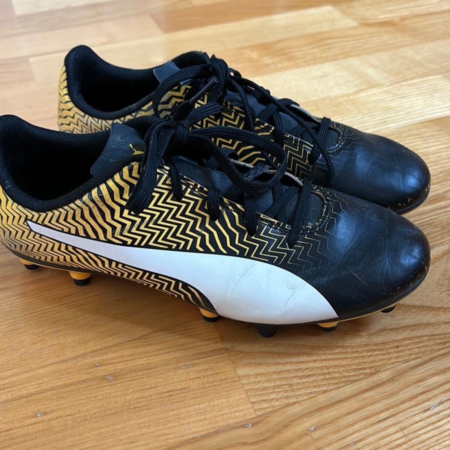 Puma Fotbollsskor Svart/Guld