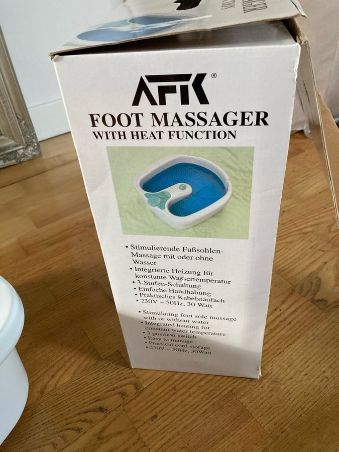 Fotmassageapparat med värmefunktion