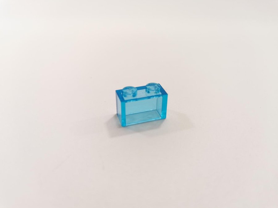 Lego - transparent - brick - 1x2 - part 3065 - ljusblå (trans light blue)