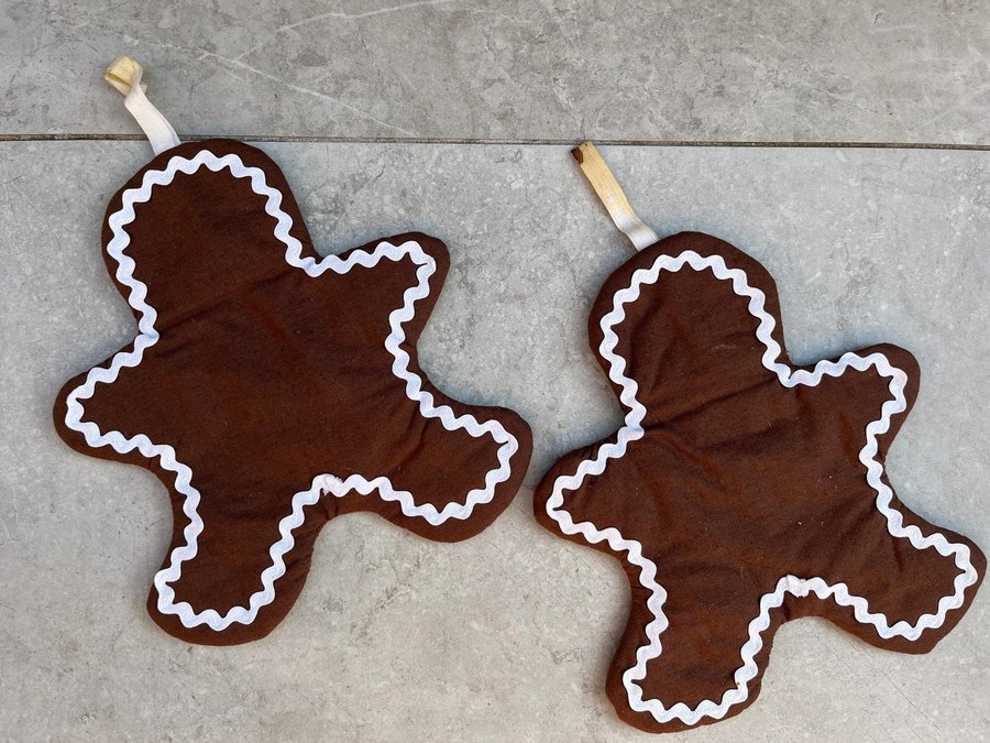 Pepparkaksgubbar som ugnsvantar