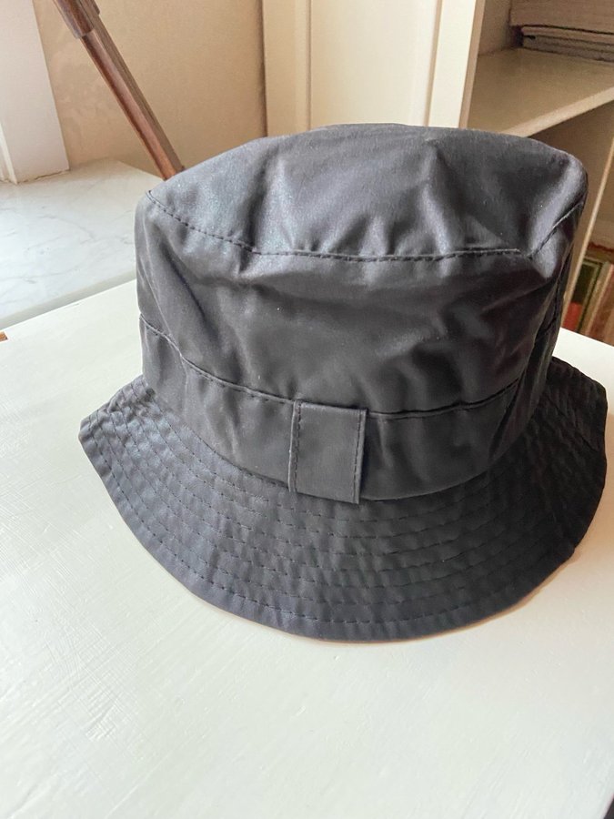 Barbour svart hatt, storlek XS