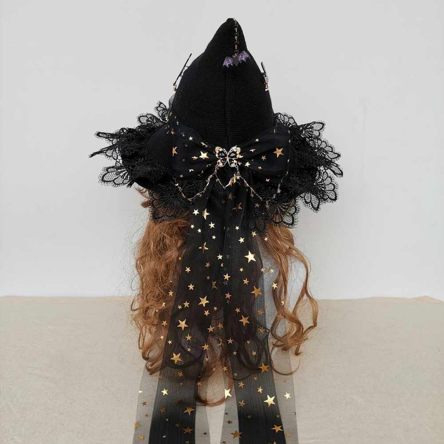 Handmade black wool blend witch hat with bow. Crochet Halloween wizard hat