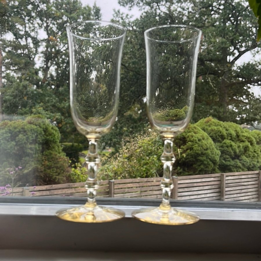 2 fina champagneglas - SALUT - från ORREFORS design Simon Gate