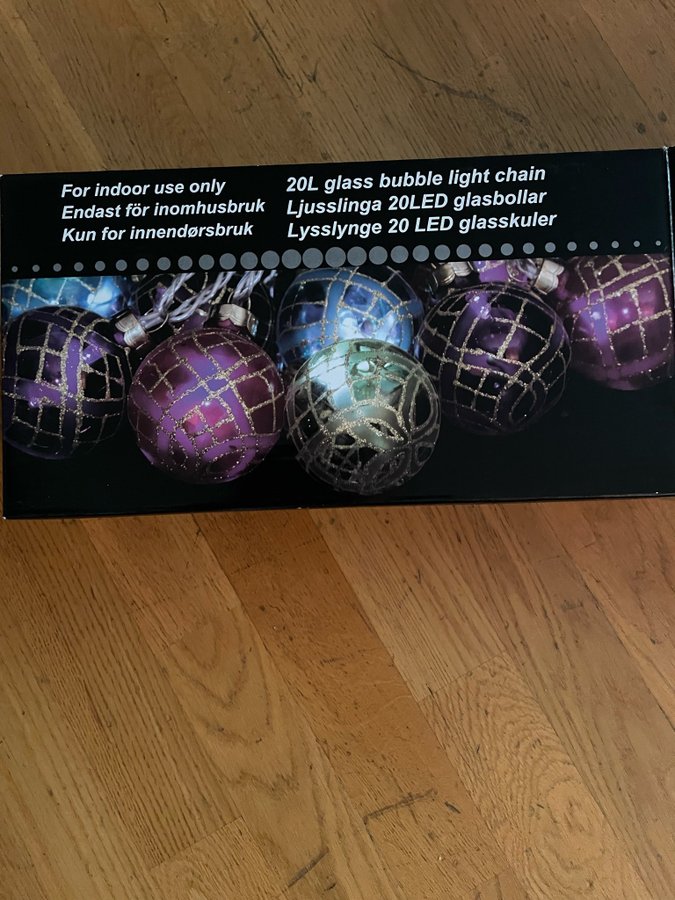 Ljusslinga 20 glaskulor med guldglitter. Led