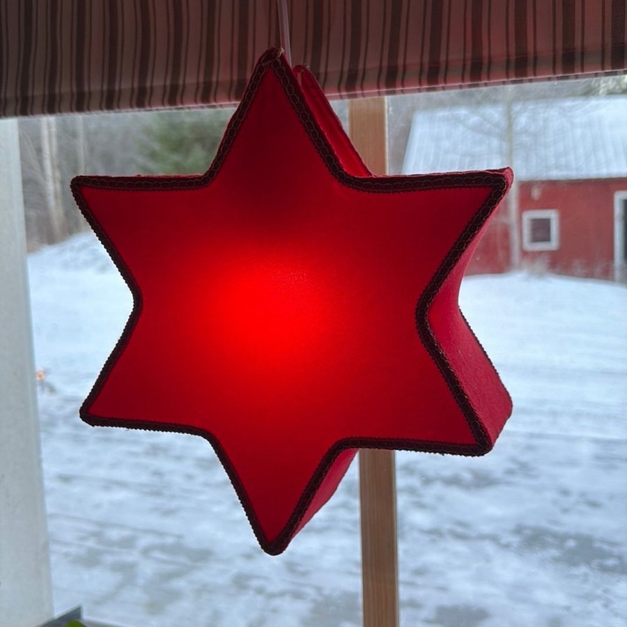 Röd stjärna lampa