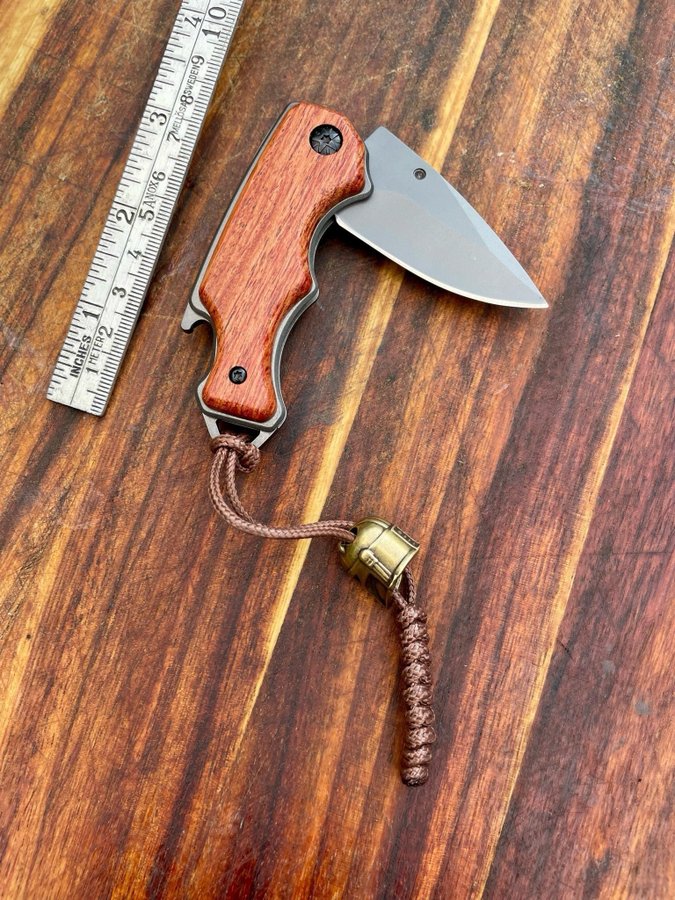 BUCK Fällkniv med flasköppnare  Lanyard