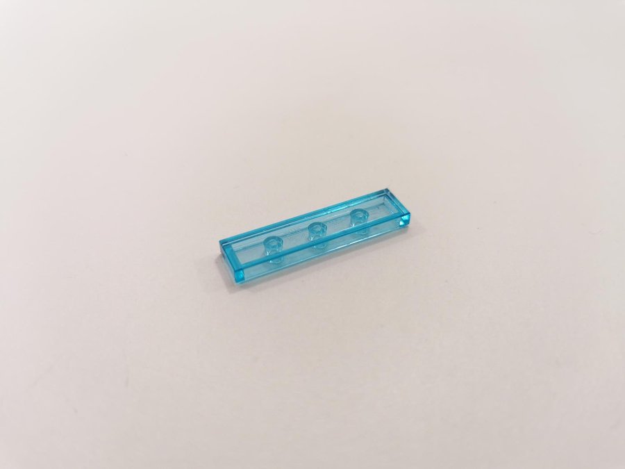 Lego - transparent - tile - 1x4 - part 2431 - ljusblå (trans light blue)