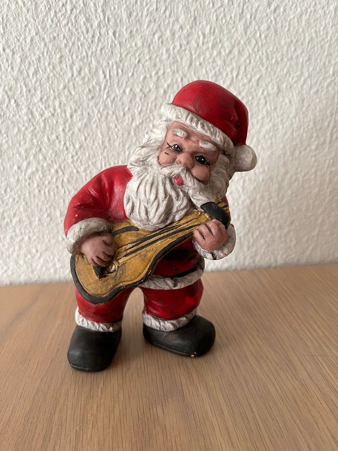 Keramik Jultomte på gitarr