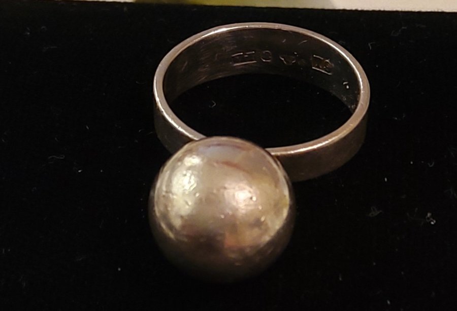 Vintage ring i silver med många stämplar