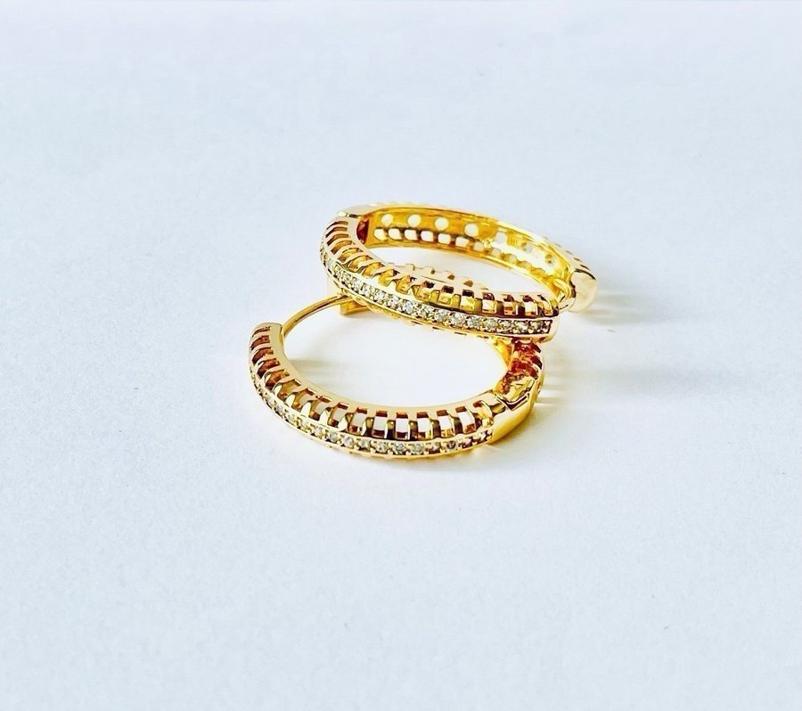 24 k Gold plated Earings with the like of diamonds