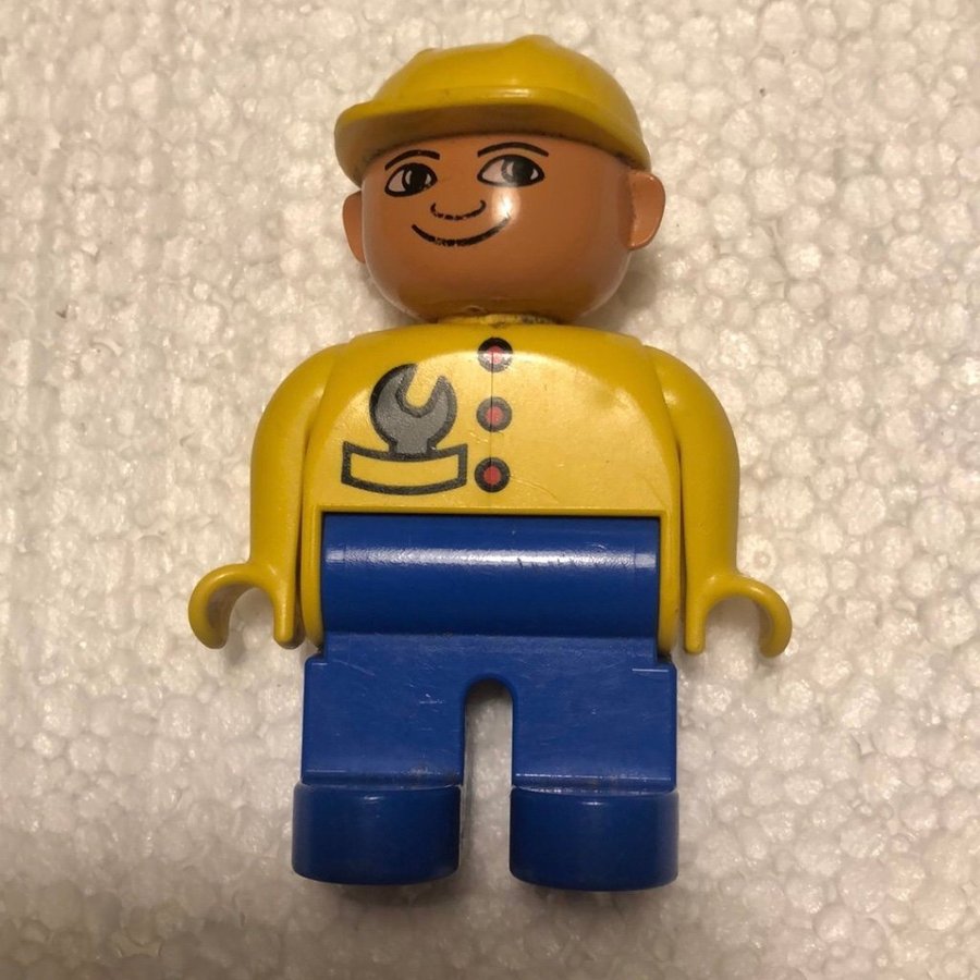 Lego Figur Duplo - Arbetare med gul tröja och blå byxor.