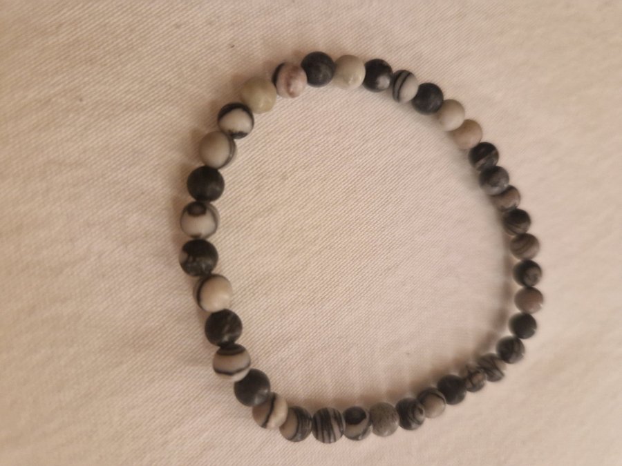 Black zebra stone beads armband