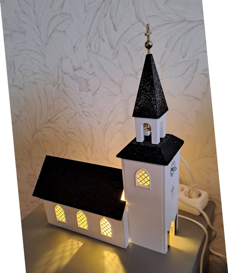 Julkyrka kyrka jul Adventskyrka med spelverk och elektrisk belysning.