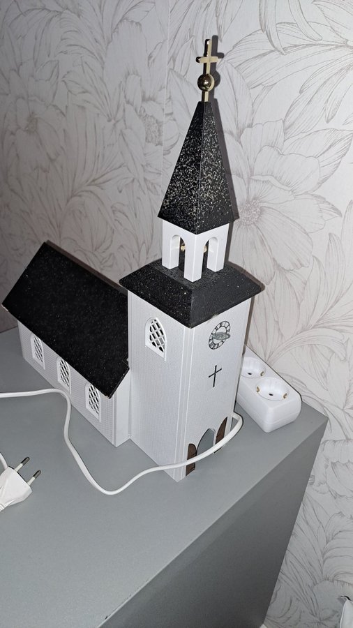 Julkyrka kyrka jul Adventskyrka med spelverk och elektrisk belysning.