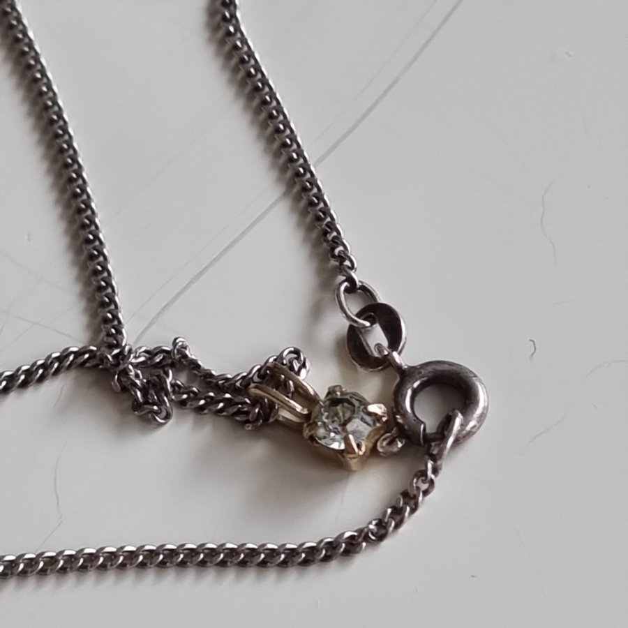 Vintage silver halsband med guldmetall hängare