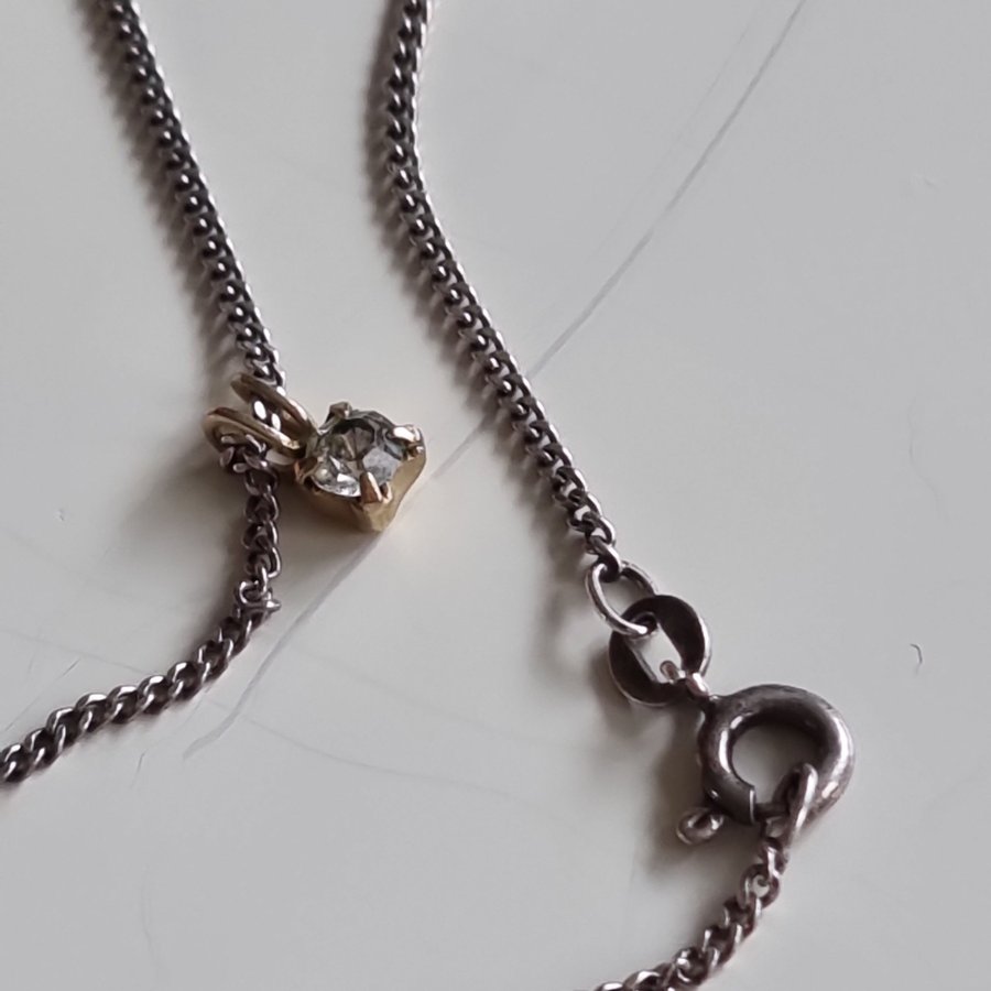 Vintage silver halsband med guldmetall hängare