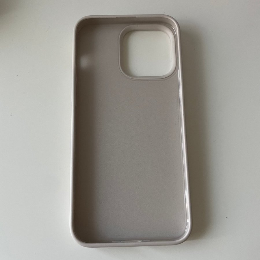 Beige Holdit skal för iPhone 15 Pro Max