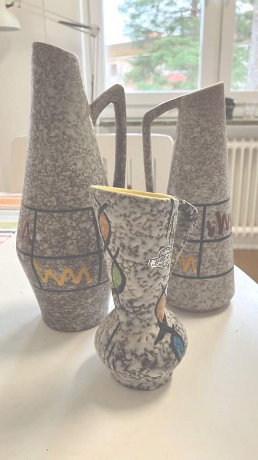 Triptych of Abstract art Vases .