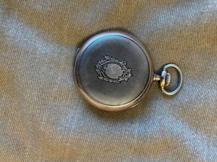 Omega pocket watch , silver 800, requires servicing ,50mm